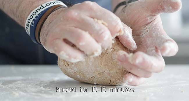 kneading cannoli dough on a clean surface