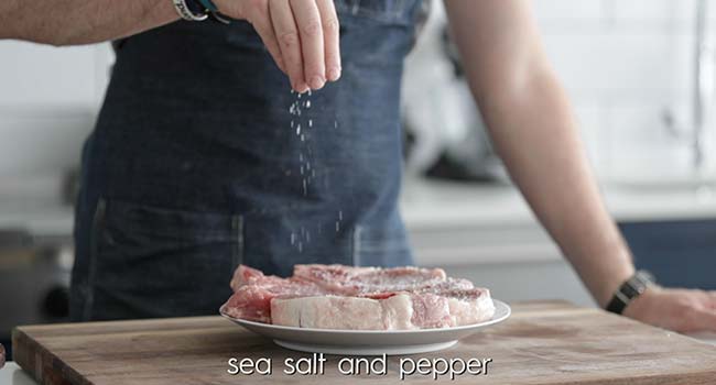seasoning bone in thick cut pork chops with salt