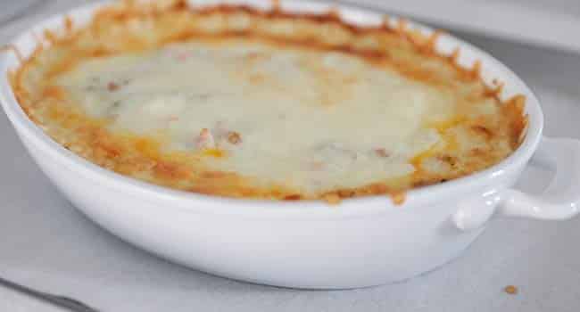 cooked queso in a casserole dish