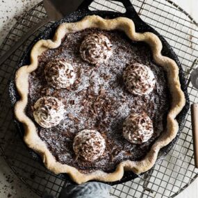 chocolate chess pie in a cast iron skillet