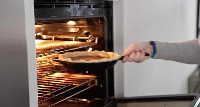 baking a pie in an oven