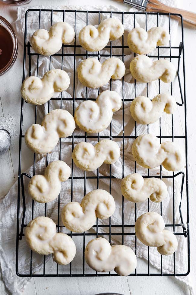 glazed baked s cookies on a rack