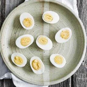 plate of hard boiled eggs cut in half