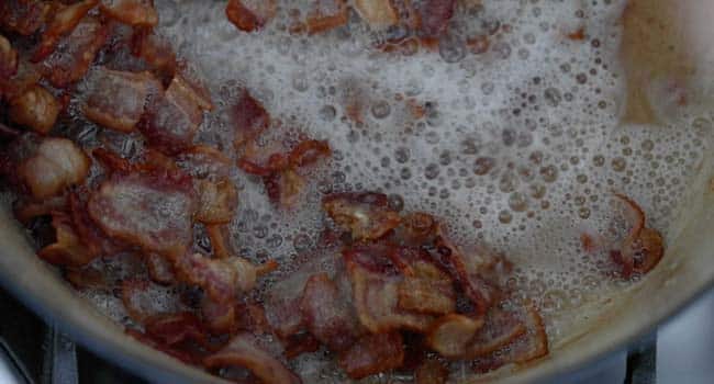 cooking bacon in a large pot