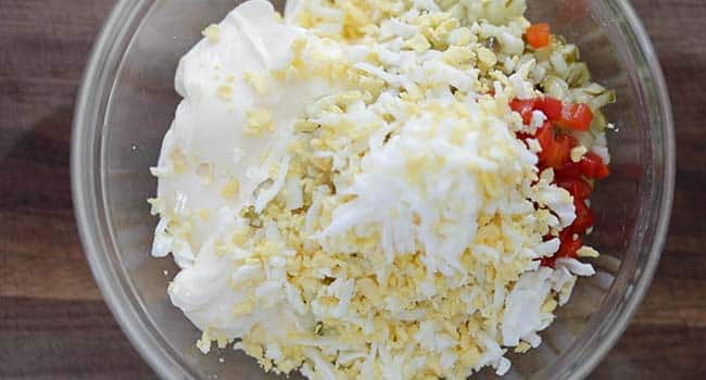 bowl of chopped hard boiled eggs and mayonnaise