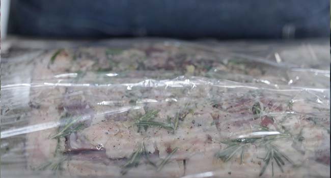 wrapping a leg of lamb in plastic wrap
