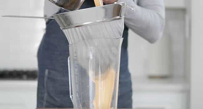 straining a shrimp bisque