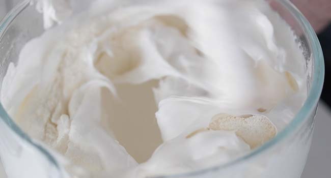 folding flour into whipped egg whites