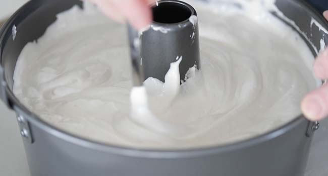 removing air bubbles from a batter in a bundt pan