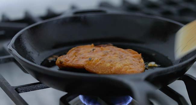 fried beef birria taco in a pan