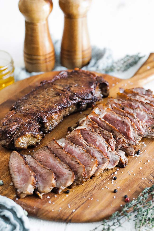 seared steak on a cutting board