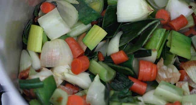 mirepoix and veggies in a large pot