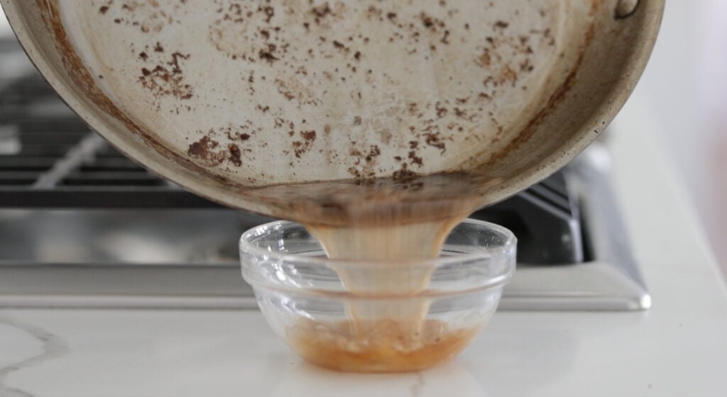 draining oil from a pan