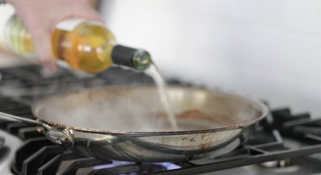 deglazing a pan with wine