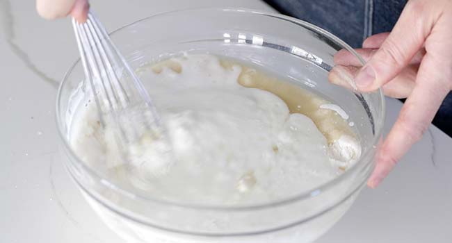 mixing buttermilk and oil in a bowl