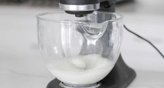 whisking egg whites to make a merengue