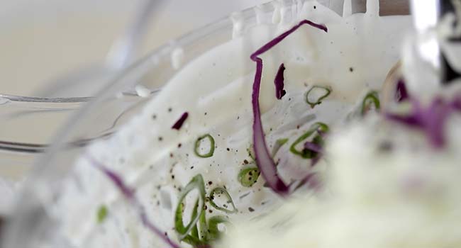 dressing the outside of a bowl with vinaigrette