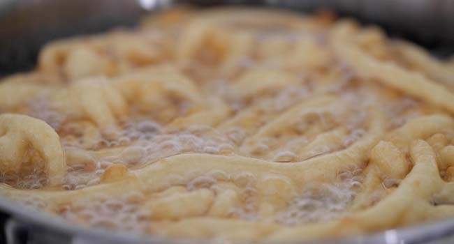 funnel cake frying in oil