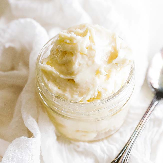 small jar of homemade mayonnaise with a spoon