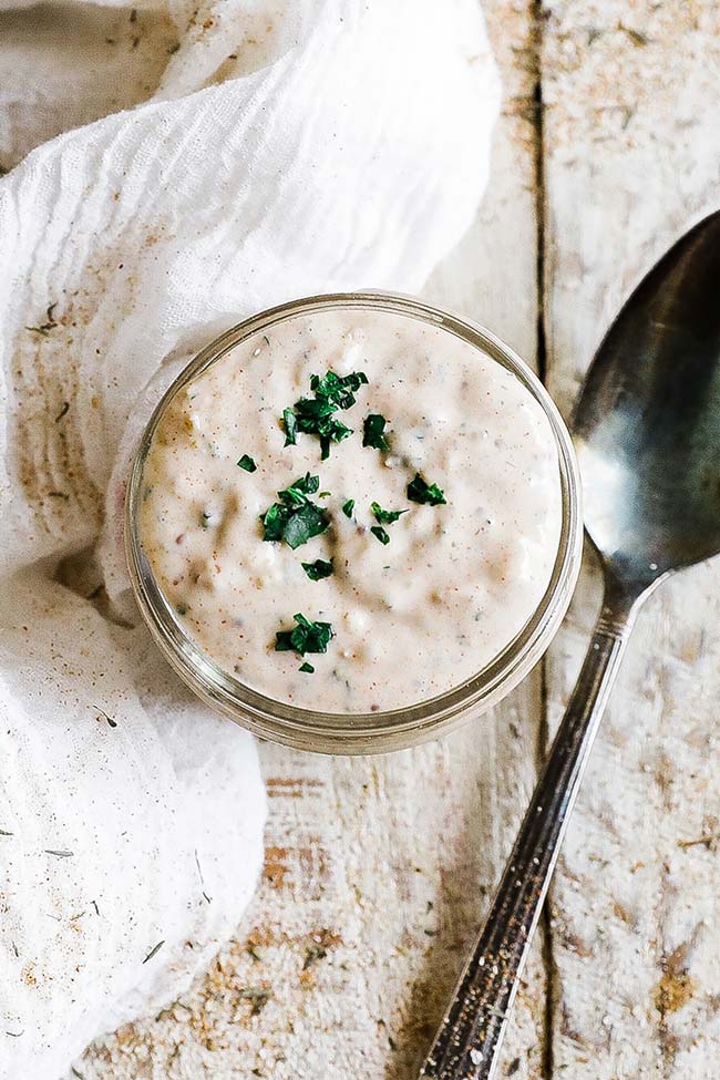 cajun remoulade sauce with chives in a jar
