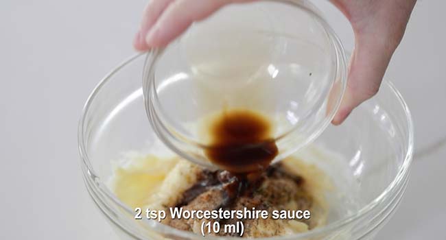 adding ingredients to a bowl of mayonnaise