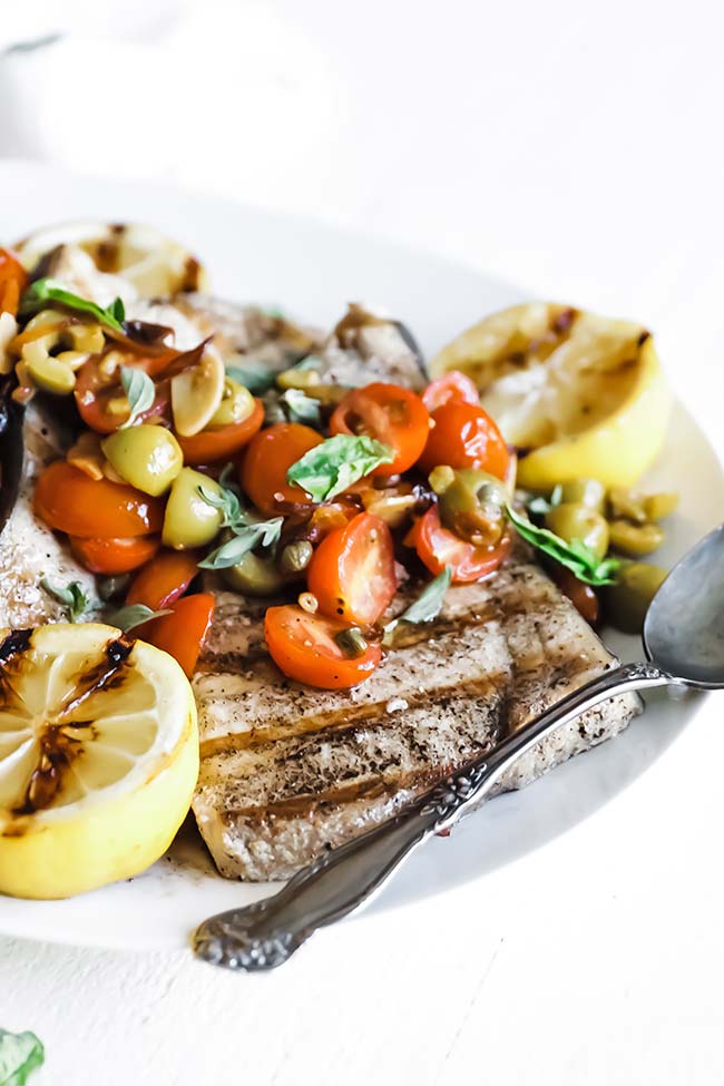 grilled swordfish sicilian style with tomatoes and olives