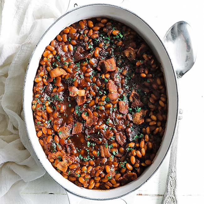 pot with baked beans and bacon