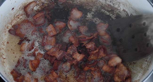 cooking bacon in a pot