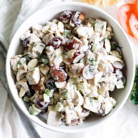 bowl of chicken salad with grapes