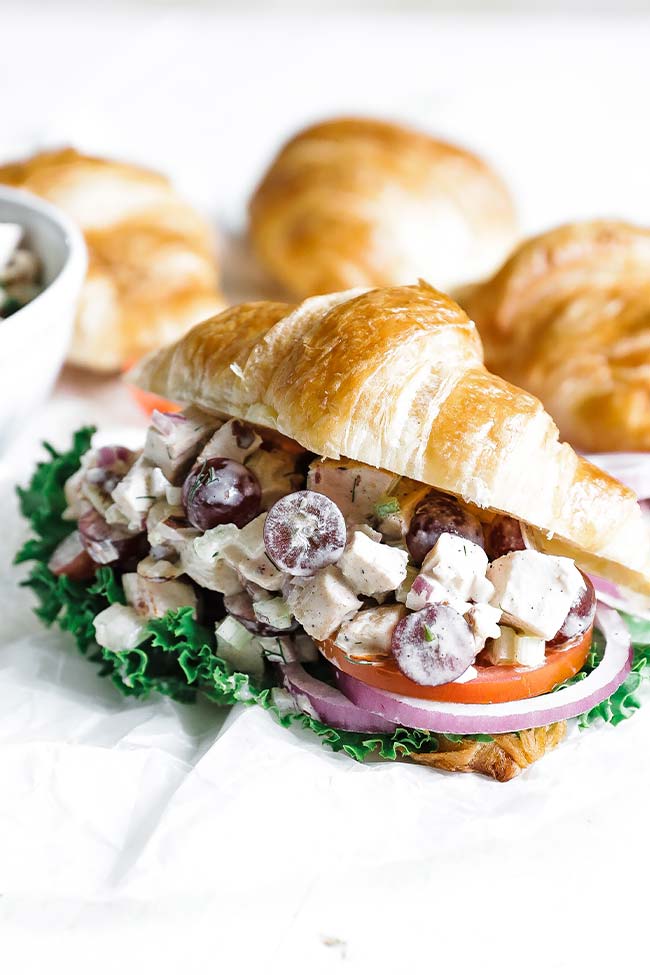 chicken salad sandwich on a croissant