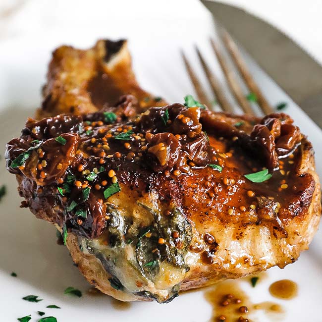 stuffed pork chop with spinach and dried cherries