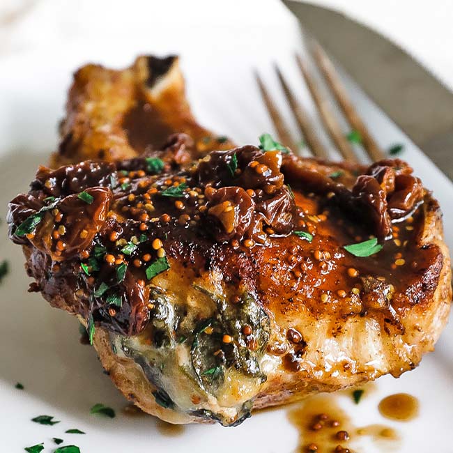 Smothered Pork Chops Recipe - Chef Billy Parisi