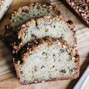 slices of zucchini bread on a cutting board