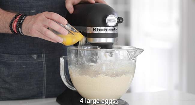 Adding 1 egg at a time to a stand mixer