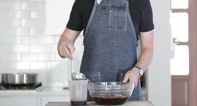 dividing a marinade into two containers