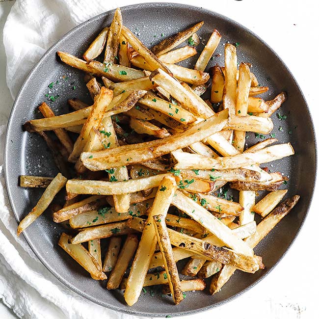 plate full of french fries or pommes frites