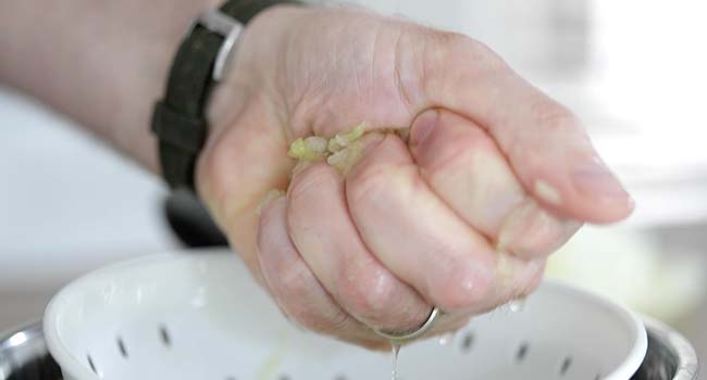 squeezing water from cucumbers