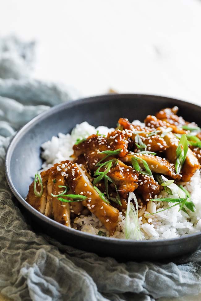 chicken teriyaki garnished with green onions and sesame seeds