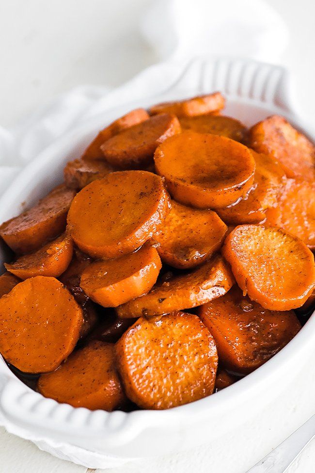 dish of sweet candied yams with cinnamon