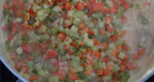 sautéing peppers, onions, and celery