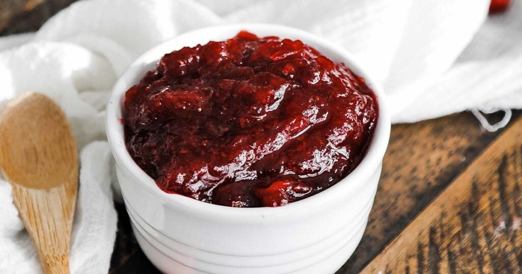 ramekin with fresh cranberry sauce