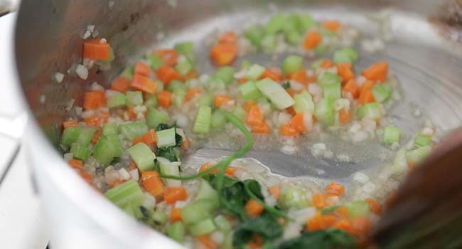 cooking vegetables and herbs in fat