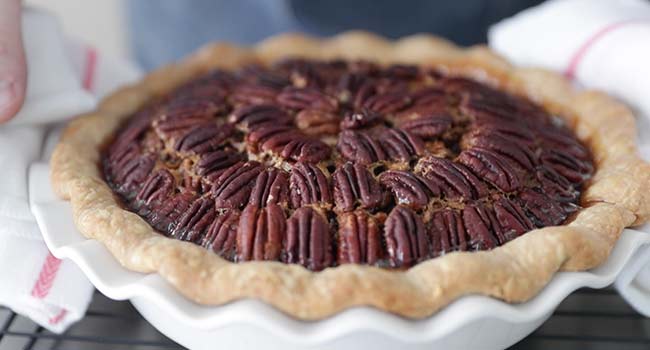 baked pecan pie on a rack