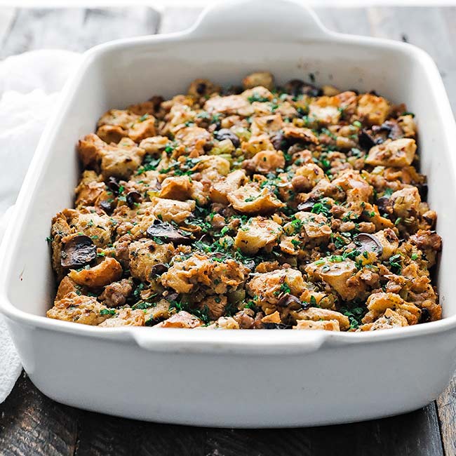 casserole dish with sausage and mushroom stuffing