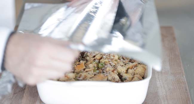 covering a sausage stuffing with foil