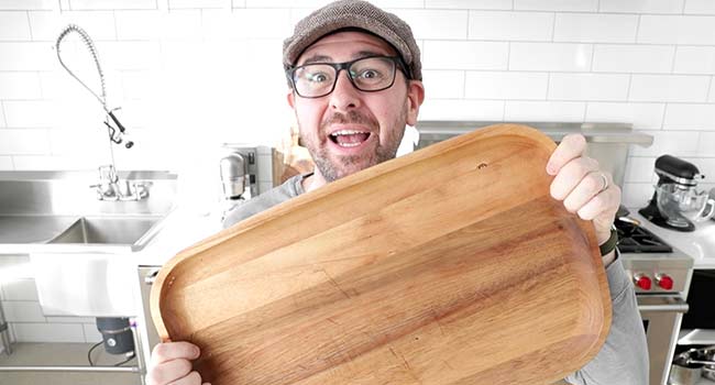 chef billy parisi holding a platter