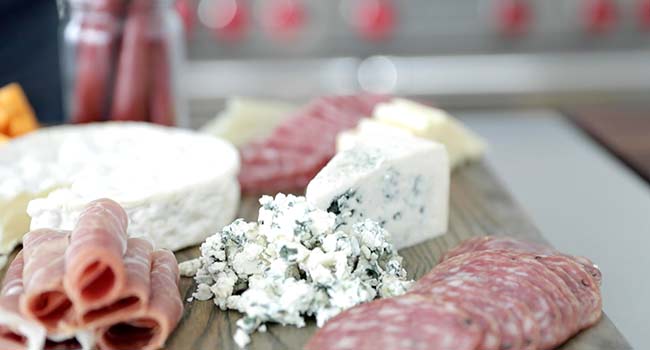 crumbled blue cheese on a platter