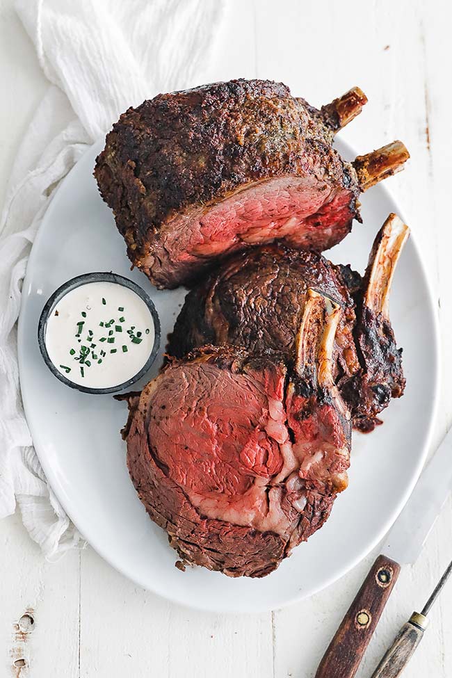 slice prime rib roast on a platter