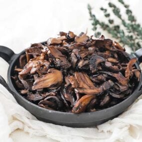 small pan full of sautéed mushrooms