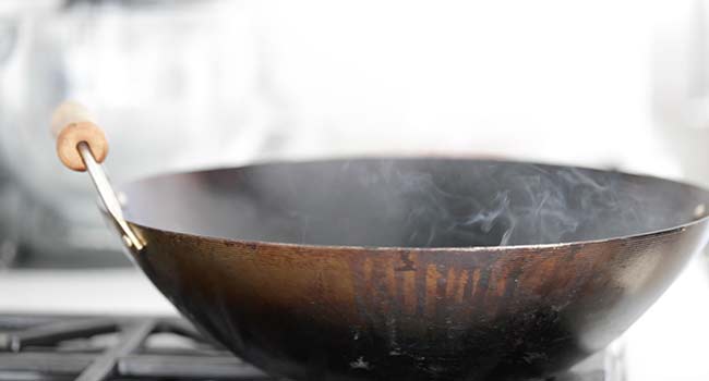 oil smoking in a wok
